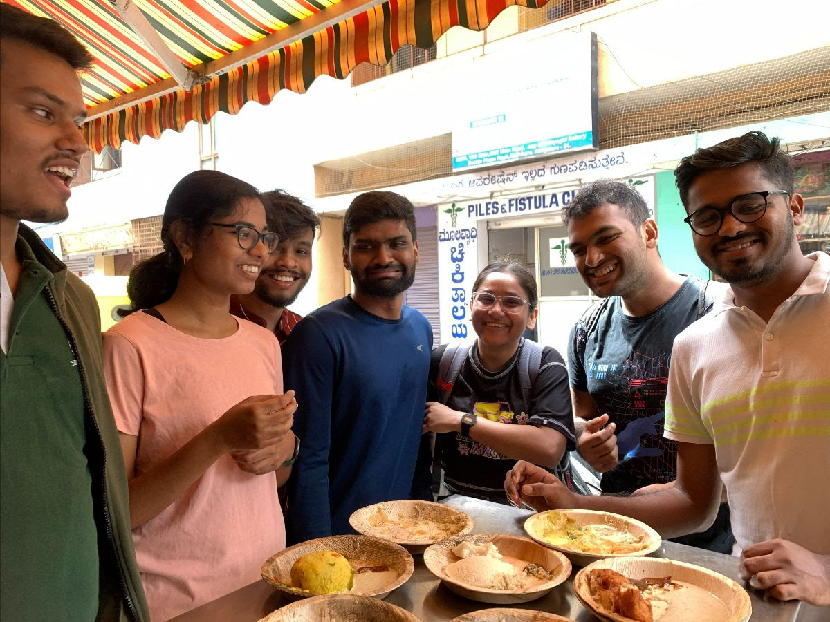 Breakfast with labmates, my last morning at IISc. Ignore the unfortunate clinic placement in the background? Left to Right: Goirik, Manogna, Anmol, Teja, Aditi, Nikhil, Suraj. (Sorry I had to use this pic, Teja - accurate representation of you being hassled on the daily, though).