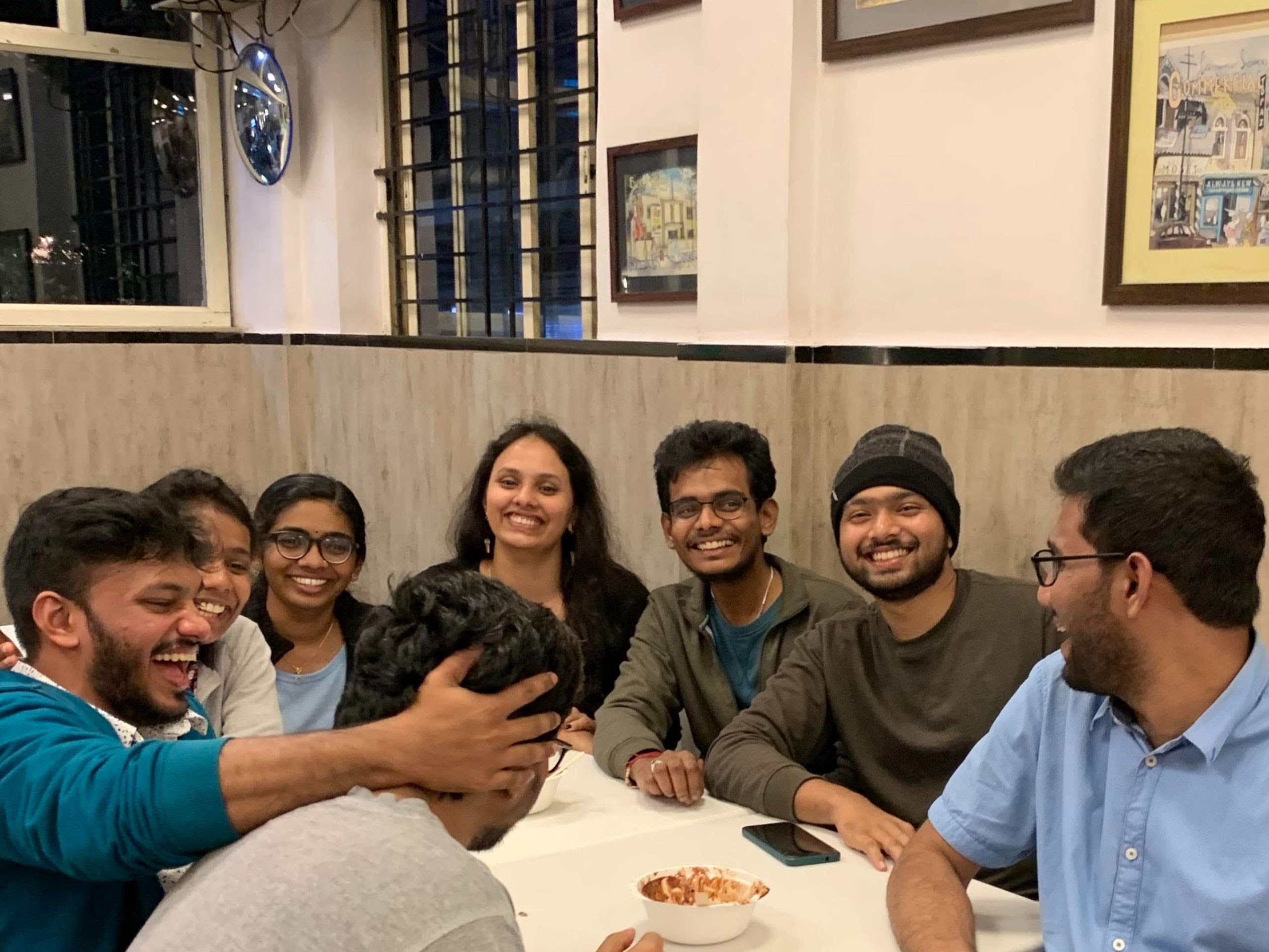 A Sunday night at Corner House. Clockwise from bottom: Sriman, Chaitanya, Athira, Aryechi, Anagha, Manikanta, Sachin and Sanjay. Different departments and states, united by DBC (Death By Chocolate, for the uninitiated. I thought it referred to Dosa Butter Coffee when I heard it first, honest mistake given Bangalore&rsquo;s love for dosa places?)